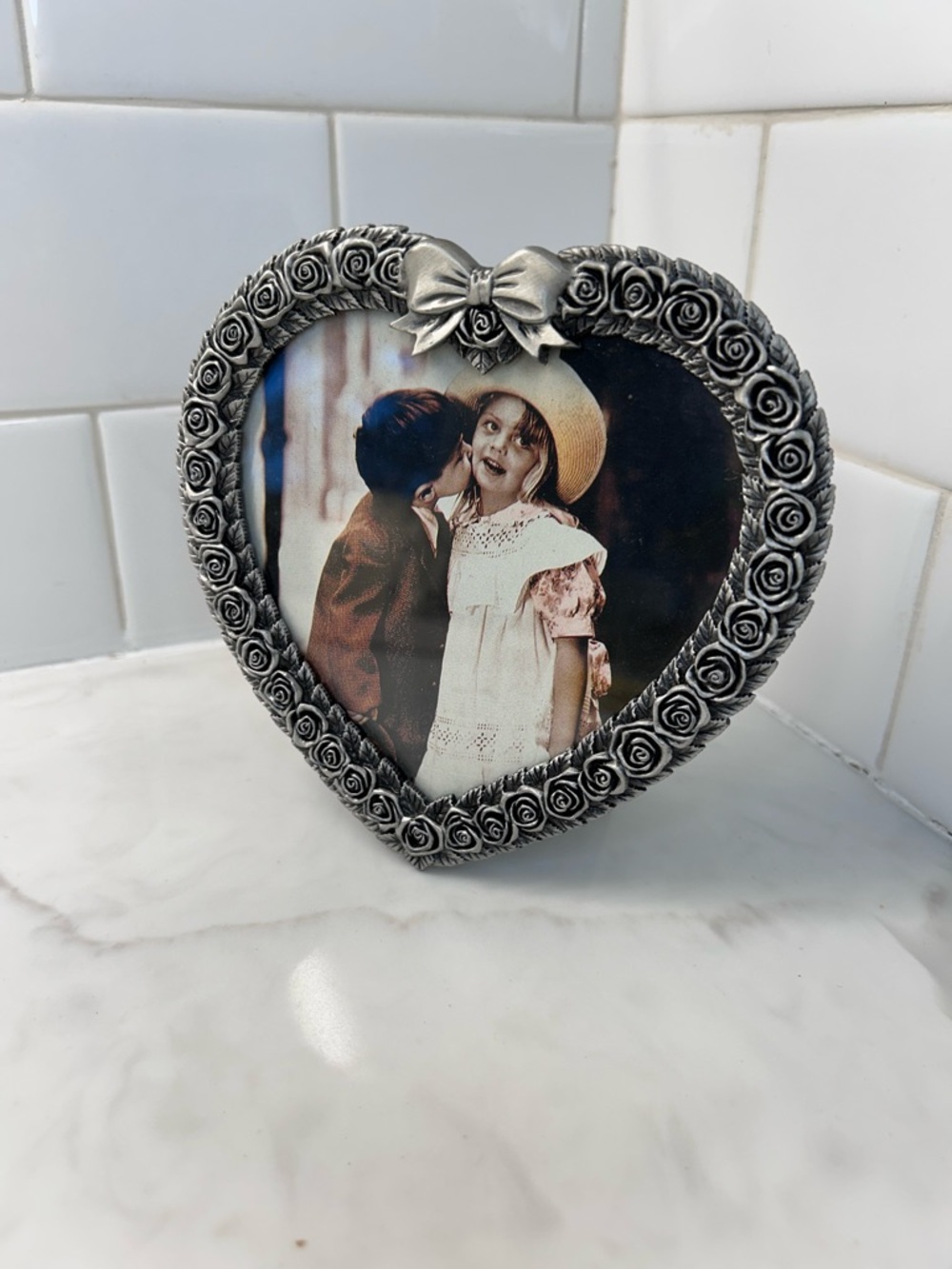 Vintage Victorian style heart frame with roses and bow made of pewter by Avon